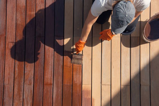 staing a deck for longer life in harsh weather by the seattle deck builder team