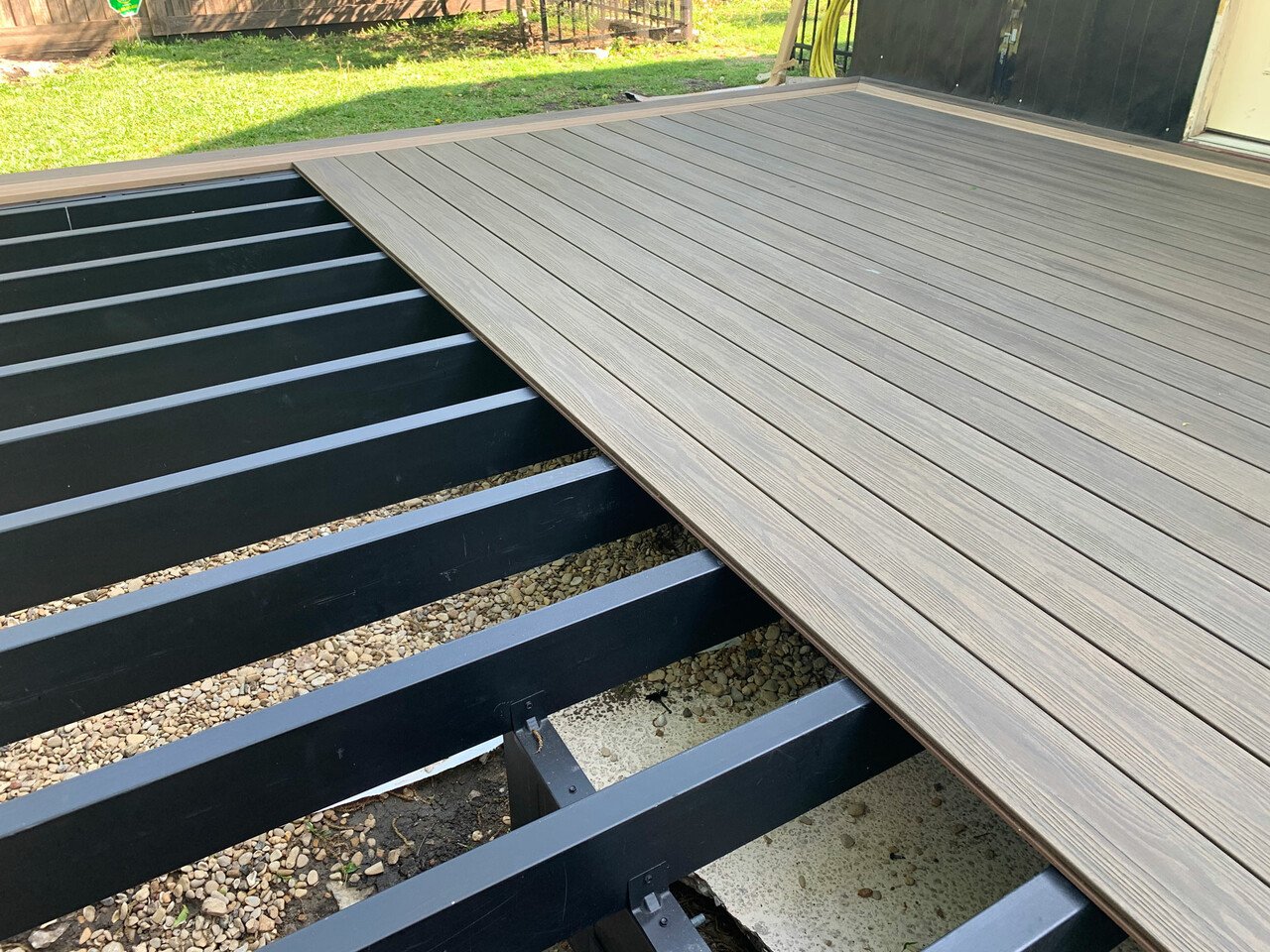 seattle deck builder installing a deck for a very happy customer